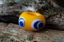 Náhled výrobku: Keltský korálek se čtyřmi oky - žlutý