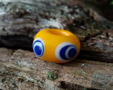 Náhled výrobku: Keltský korálek se čtyřmi oky - žlutý