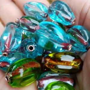 Náhled výrobku: Olivovitá perla s měděnou trubičkou